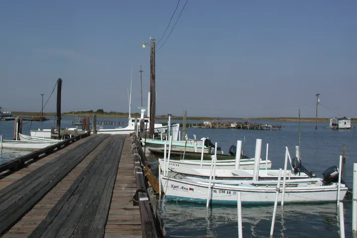 Boats parked on a dock on Tangier Island